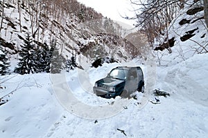 Car stuck in a snow avalanche