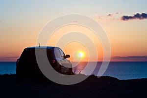 Car and sunset