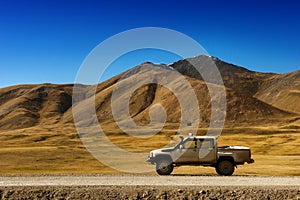 Car SUV on the mountains background