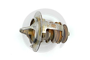 Car Thermostat , old thermostat, engine thermostat valve. Auto part, elements of the engine cooling system isolated on white