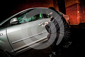 Car thief in a mask.