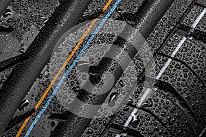 Car tire aquaplaning risk tire with raindrops