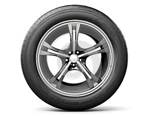 car tire isolated on white background. Detailed tread pattern visible on surface, appears new or unused, clean and sharp treads