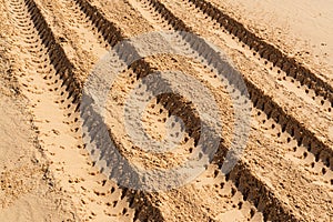 Car tire marks in the sand. car tracks. desert. more sand