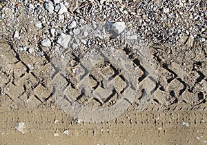 Car tire tracks on wet muddy trail royalty, road, abstract background, texture material. Tyre track on dirt sand or mud, retro