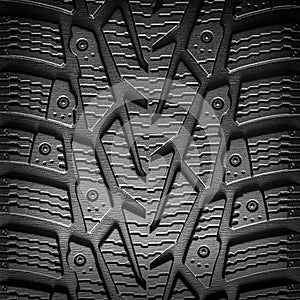 Car tire tread background closeup.