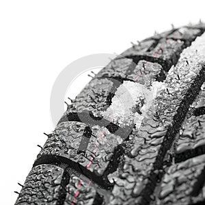 Car tires close-up Winter wheel profile structure with snow on white background