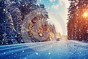 Car tires on winter road