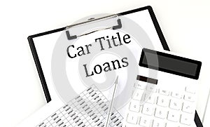 CAR TITLE LOANS text on folder with chart and calculator on white background