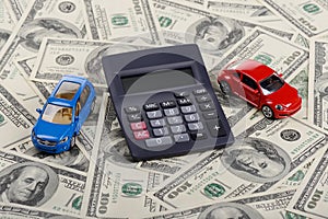 Car toys and calculator stay on the dollars