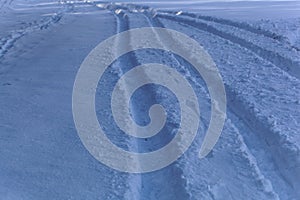 Car traces in snow