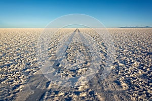 Car tracks in Salar de Uyuni Uyuni salt flats, Potosi, Bolivia