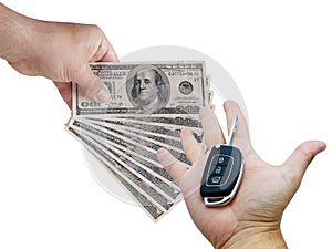 Car trading concept. Male hands buying and selling money dollar bills key car isolated