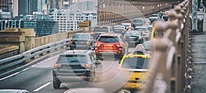 Car traffic entering a city bridge, business concept