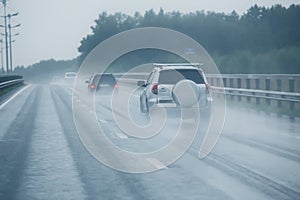 car traffic on highway in rain