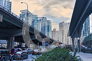 Car traffic jam at the entrance of a freeway in downtown Toronto. City and transport concept. Toronto, Ontario, Canada