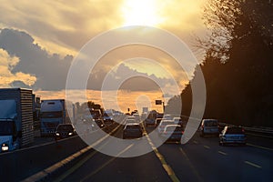 Car traffic jam on the highway during the evening rush hour.Shooting from the car cabin.