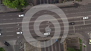 Car traffic at the multi-level junction top view. Shooting traffic from top to bottom with a clockwise turn at the