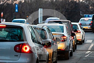 Car traffic at rush hour in downtown area of the city. Car pollution, traffic jam in the morning and evening in the capital city