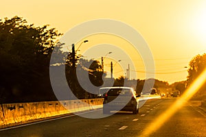 Car traffic at rush hour in downtown area. Traffic jam, cars on the road at sunset in Bucharest, Romania, 2020