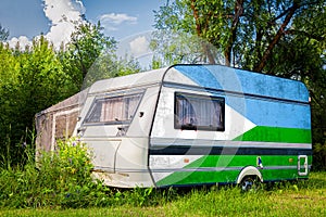 A car trailer, a motor home, painted in the national flag