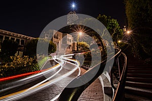 Car trails at night at Lomard Street, San Francisco