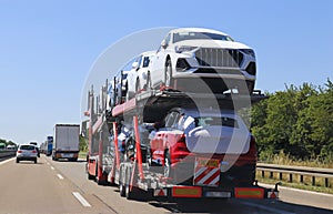 Car transporter on a highway