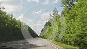 Car travel. view of the road through the windshield