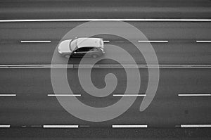 Car traveling on an empty road