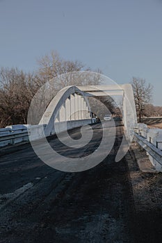 Car traveling on the one-way Rainbow Bridge on Route 66 near Chetopa, Kansas,