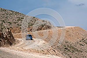 A car travelling on high plateau roads in Turkey