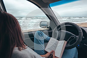 Car trip by cold sea in winter