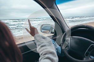 Car trip by cold sea in winter