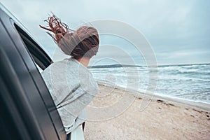 Car trip by cold sea in winter