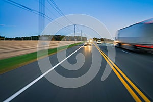 Car and truck traffic on rural highway