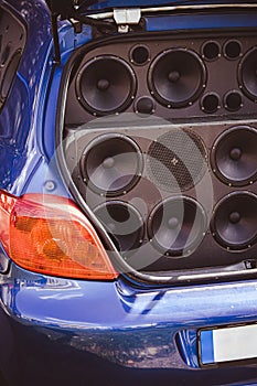 Car trunk full of stereo speakers