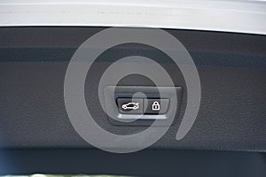 Car trunk lid open button for locking or unlocking