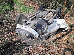 Car turned upside-down after accident.