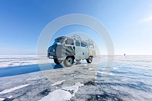 Car UAZ minibus on the ice of Lake Baikal