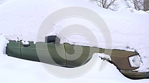 Car in under the snow. A large amount of snow almost completely fell asleep car