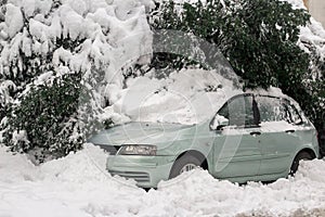 Car under the snow. Winter weather specific