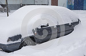 Car under snowdrift.