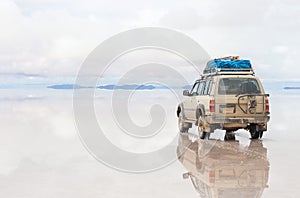 Car on the Uyuni Salar in Bolivia