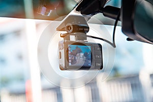 Car video camera attached to the windshield to record driving and prevent danger from driving