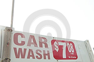 car wash 708 7 dollars plus tax minimum 25 litre gas horizontal rectangle sign. ph