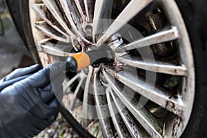 Car wash. Cleaning aluminum wheels. Car washing