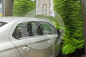 Car wash. Cleaning high-pressure water cars and foam in the washing station