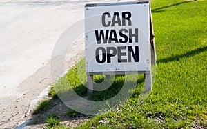 Car Wash Open Sign on Curb