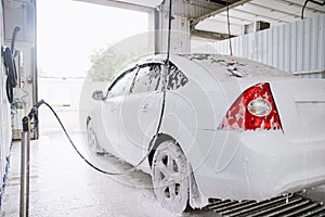 Car wash with soap.Car getting a wash with soap, car washing
