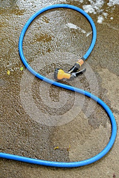 Car wash tool on ground, Water spray